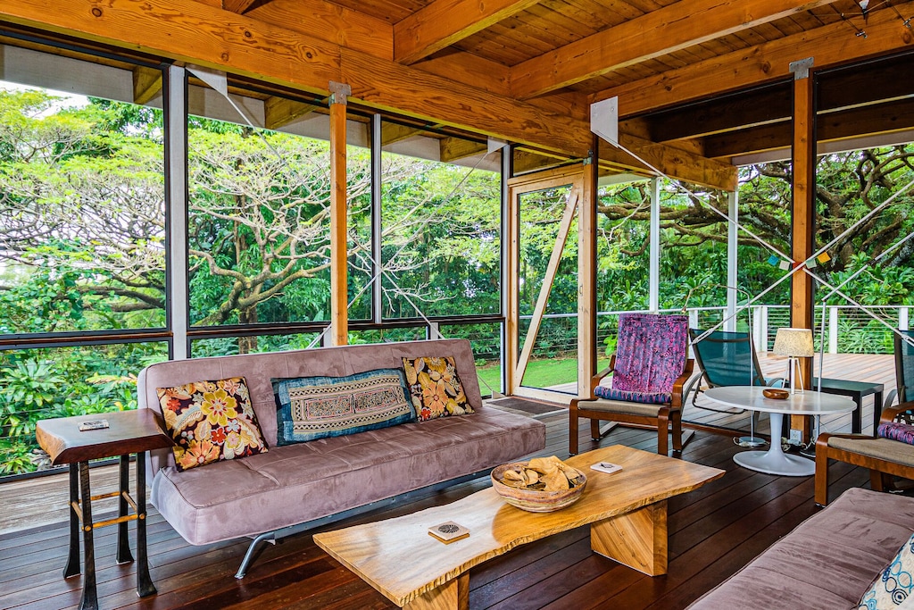 Lanai surrounded by tropical vegetation