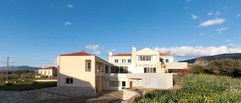 Front elevation view of Blue Seas Villa in the spring. 