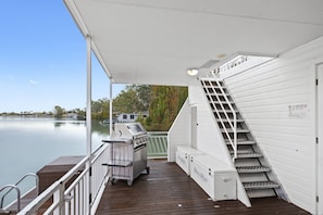 Spacious undercover rear deck for dining with a view! 