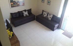 Nada como ver uma TV no sofá para relaxar depois de um dia de praia