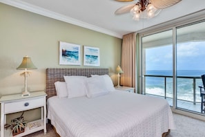 Master bedroom has a king bed and access to the private balcony