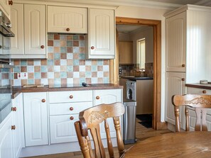 Cabinetry, Furniture, Countertop, Kitchen, Wood, Chair, Kitchen Appliance, Interior Design, Drawer, Building