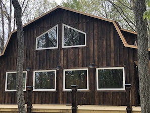 This side of the cabin is a wall of windows for lots of light/ beautiful views