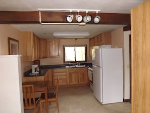 The kitchen as viewed from the entryway.