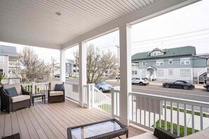 People watch from the well furnished front porch