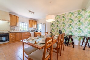 Open plan Dining and fully equipped kitchen area 