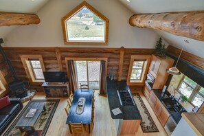 View from the loft of the kitchen, dining area and living room. 