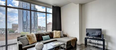 Floor to ceiling windows offer a great view of downtown