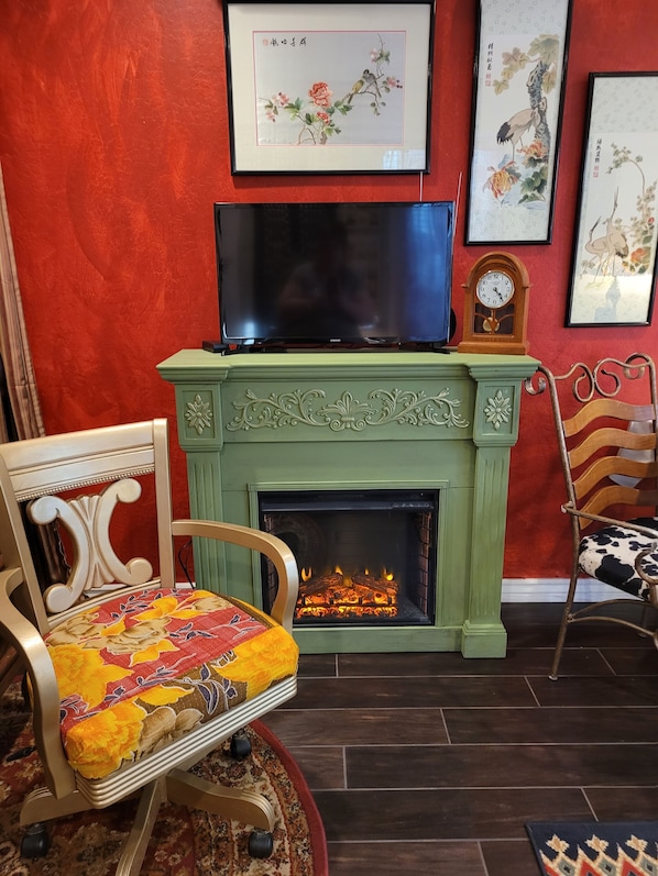enjoy the cozy no mess fireplace! 