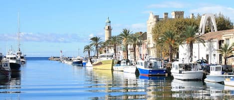 Water, Boat, Sky, Watercraft, Plant, Building, Azure, Lake, Tree, Coastal And Oceanic Landforms