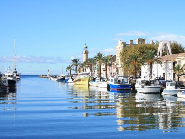Water, Boat, Sky, Watercraft, Plant, Building, Azure, Lake, Tree, Coastal And Oceanic Landforms