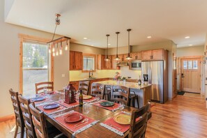 Open dining room is close by the kitchen for easy dinners and clean up.