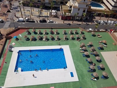 Apartamento en 1º línea con piscina comunitaria, wifi gratis, AC y calefacción