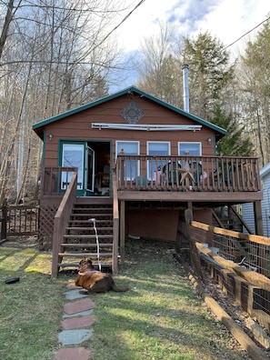 Front deck with fenced in yard for animals.