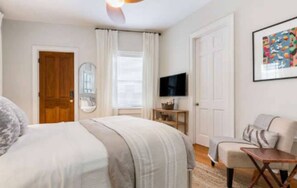 Bedroom with door to Bathroom on right 