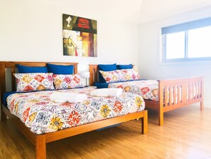 Master bedroom with en-suite and 2 queen beds 
