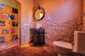 Bath/Shower. A wine lovers bathroom - featuring an old wine press sink and wine corks in the flooring