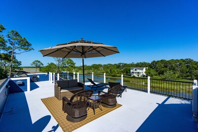 Waterfront Luxe w/ Rooftop Deck & Elevator at a Great Price