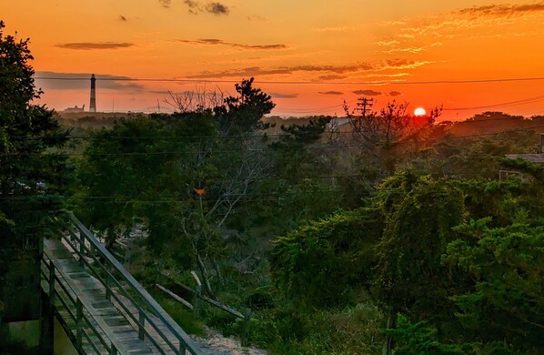 Sunset and lighthouse view from the upper deck. 