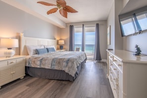 Gulf front master bedroom with a king size bed.