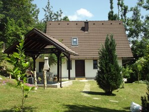 Area that directly surrounds the property. House - arbour