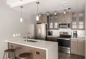 Go out or stay in - whether you can cook or not, Kasa offers all the comforts of home, including a full kitchen with utensils.