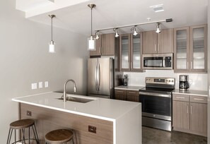 Go out or stay in - whether you can cook or not, Kasa offers all the comforts of home, including a full kitchen with utensils.