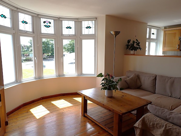 Front living room with views onto Griffin Park, Coney beach 300 yards from door