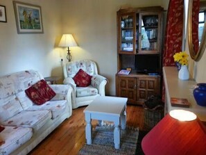Living area. Living room with open fire.