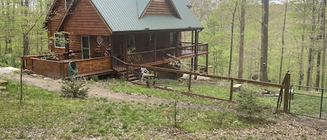 Fenced yard with Fire pit.