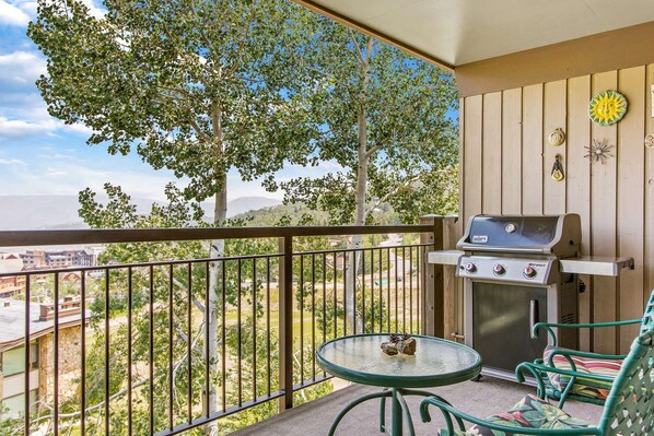 The private balcony offers a relaxing space for grilling, reading, or just soaking up the views.