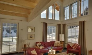 Cozy living area with open gallery