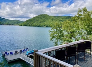 Spend leisurely days at our deck & dock just down the street from our cabin!
