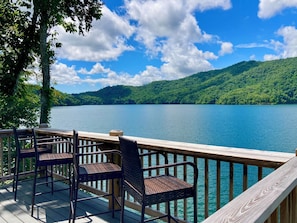 Relax at our upper deck leading down to our 20x20 private dock w/ swim ladder