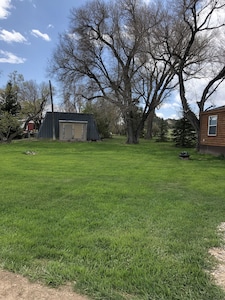 Home on a working ranch just minutes away from Glendo Reservoir.
