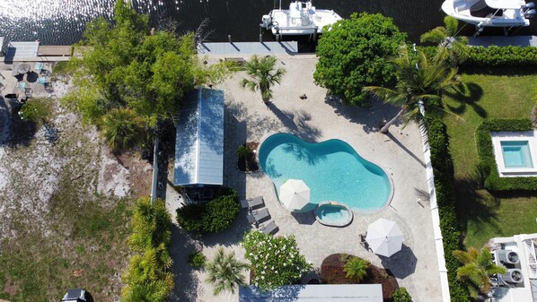 Seabatical beautiful pool area with a canal view