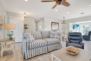 A sleeper sofa and leather reclining chair in the living room