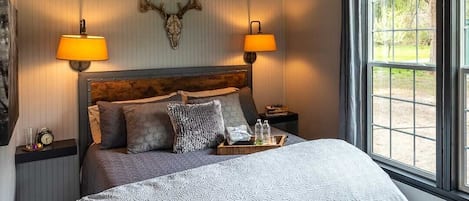 The "Timber Room" features luxury bedding and convenient reading lights.