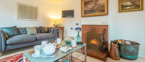 1 Market Hill: Sitting room with open fire