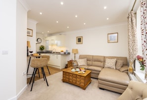 Berwick, Wimborne Minster: Sitting room and kitchen with dining area
