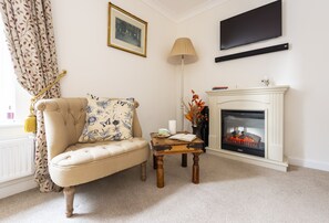 Berwick, Wimborne Minster: Sitting room with feature fire