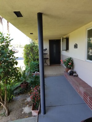 front door entrance opens to living room area