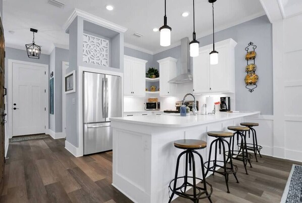 Gorgeous brand new kitchen stocked with all of your cooking, baking and entertaining needs!