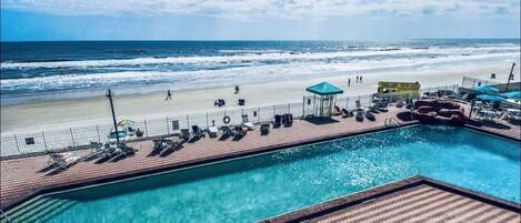 Pool with gated beach access. 