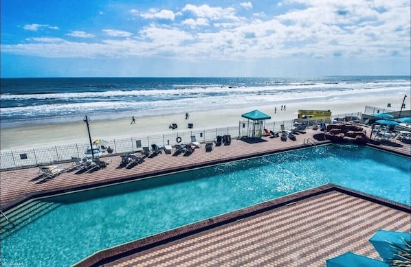 Pool with gated beach access. 