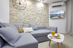 Living area. Extendable sofa