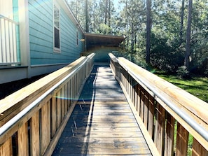 Ramp leading to back deck and back door