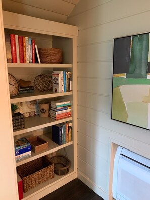 Bookshelf at the top of the stairs