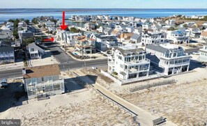 Four houses to the ocean beach, and a very short walk to the bay beach.