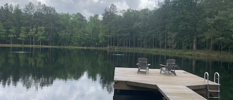 2.5 acre stocked pond with pier 
